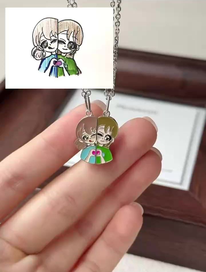 Two half-pendants that join magnetically